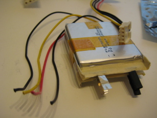 Photo of partially assembled Lithium Polymer battery pack and salvaged 20AWG wire from floppy drive power connector.