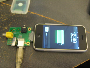 Photo of a partially assembled Ultradock Lite (version 2) charging a first generation iPhone