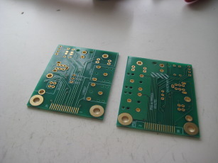 Photo of two Ultradock Lite (version 2) boards, showing front and back design