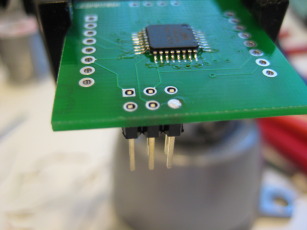 Photo showing how programming header is flush with display side of the board.